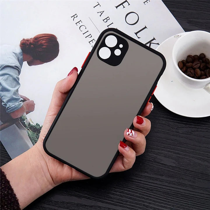 Shockproof iPhone case grey with red button in hand cup coffee magazine