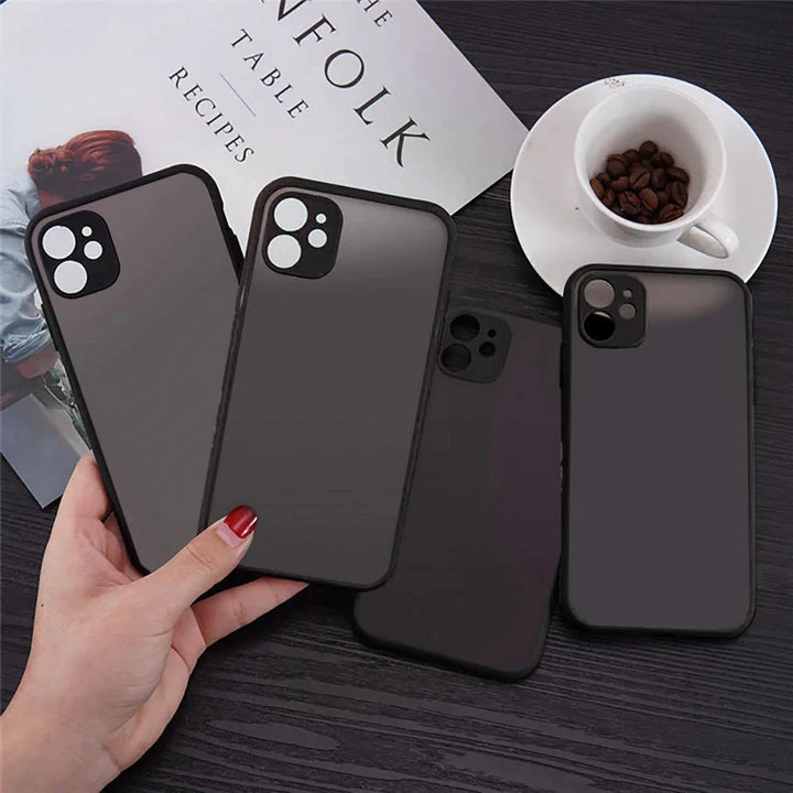 Shockproof iPhone case four grey cases on the phones on the table in hand cup coffee magazine